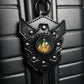 Mountain Cross leather shield luggage tag attached to a suitcase
