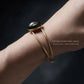 Adjustable cuff bracelet side profile worn on wrist