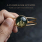 Raised glass dome center detail on Psalm 121 cuff bracelet